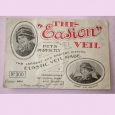 A Victorian packet containing an elastic hat or face veil