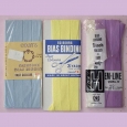 Three packets of vintage bias binding - pale blue, lemon and lilac