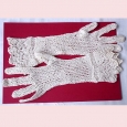 A vintage pair of crochet gloves. - F2