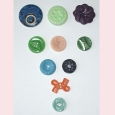 A selection of ten coloured vintage buttons - S4