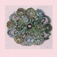 A vintage silk embroidered flower motif on net - O5