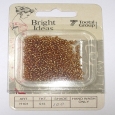 A vintage packet of Bright Ideas tiny gold coloured beads.